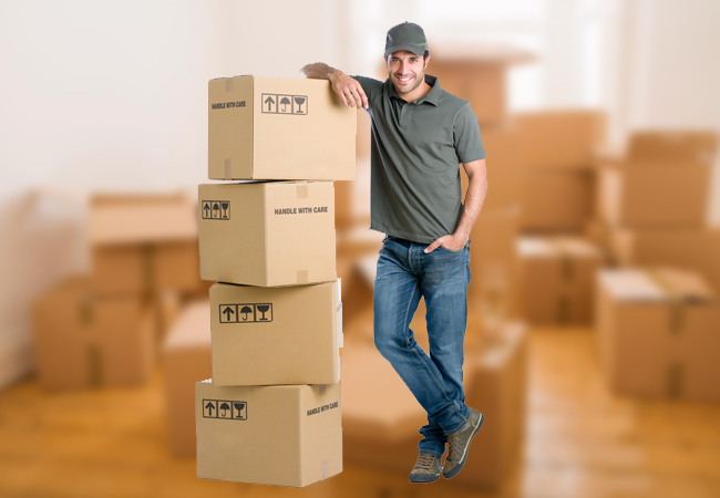 Professional movers packing boxes